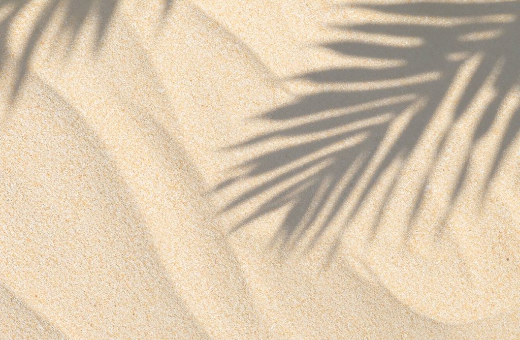 Soft neutral spa-inspired background representing beauty and wellness at The Infinity Glow